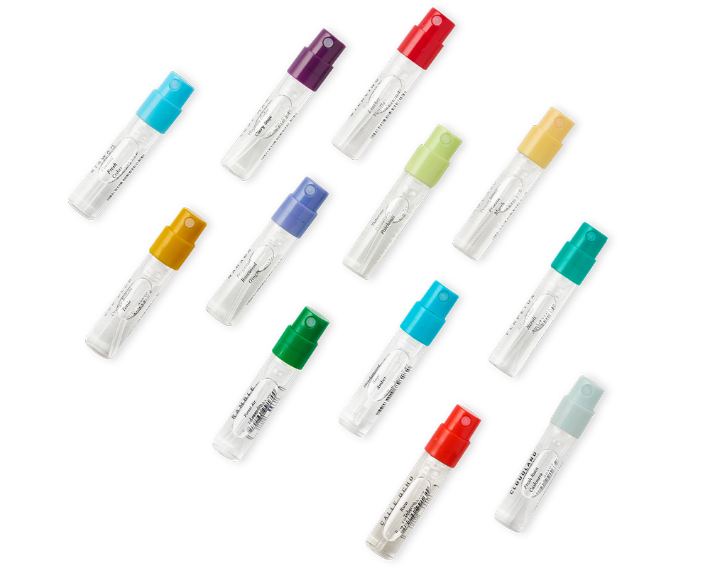 Multiple loose fragrance vials laying flat